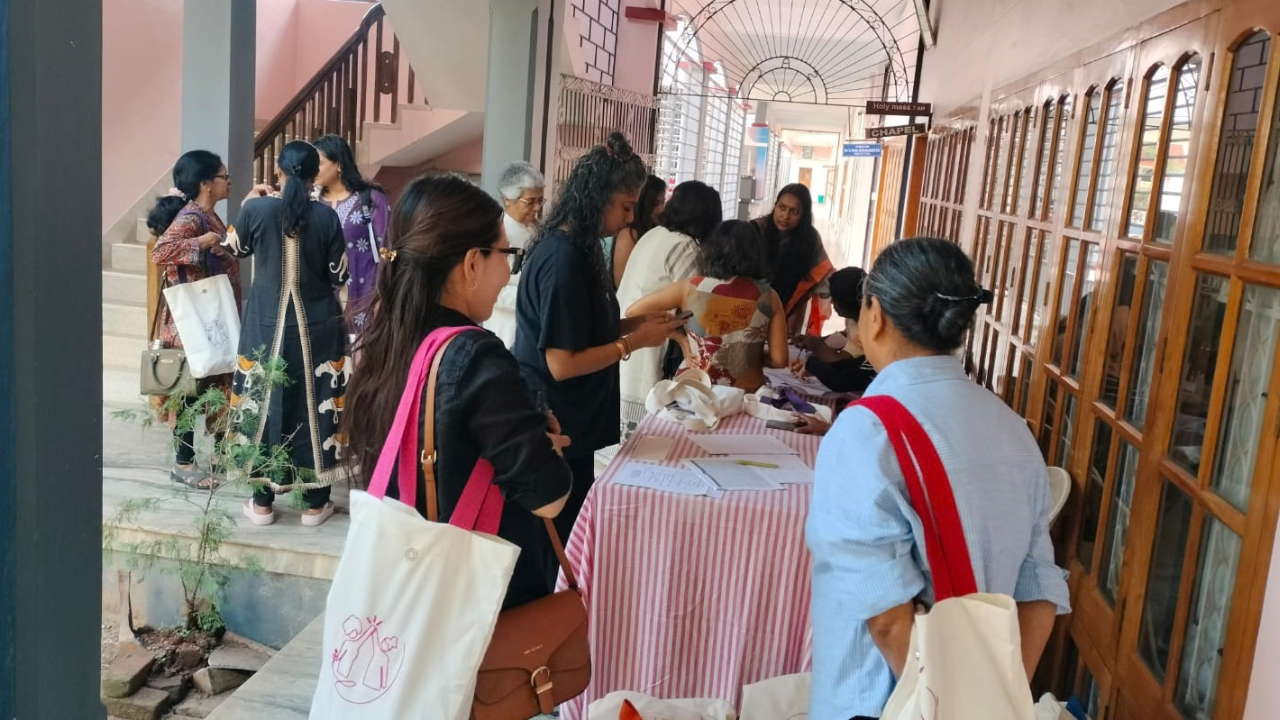 Participants seen at the registration desk at the 2026 NWMI National Meet in Thiruvananthapuram