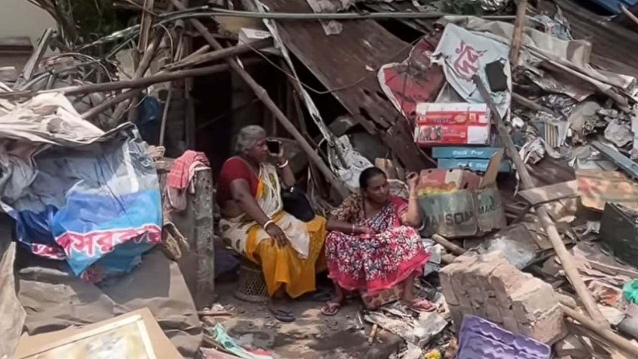 Women hawkers near Dum Dum Junction Railway station sitting amidst debris, after their stalls were demolished in the eviction drive.